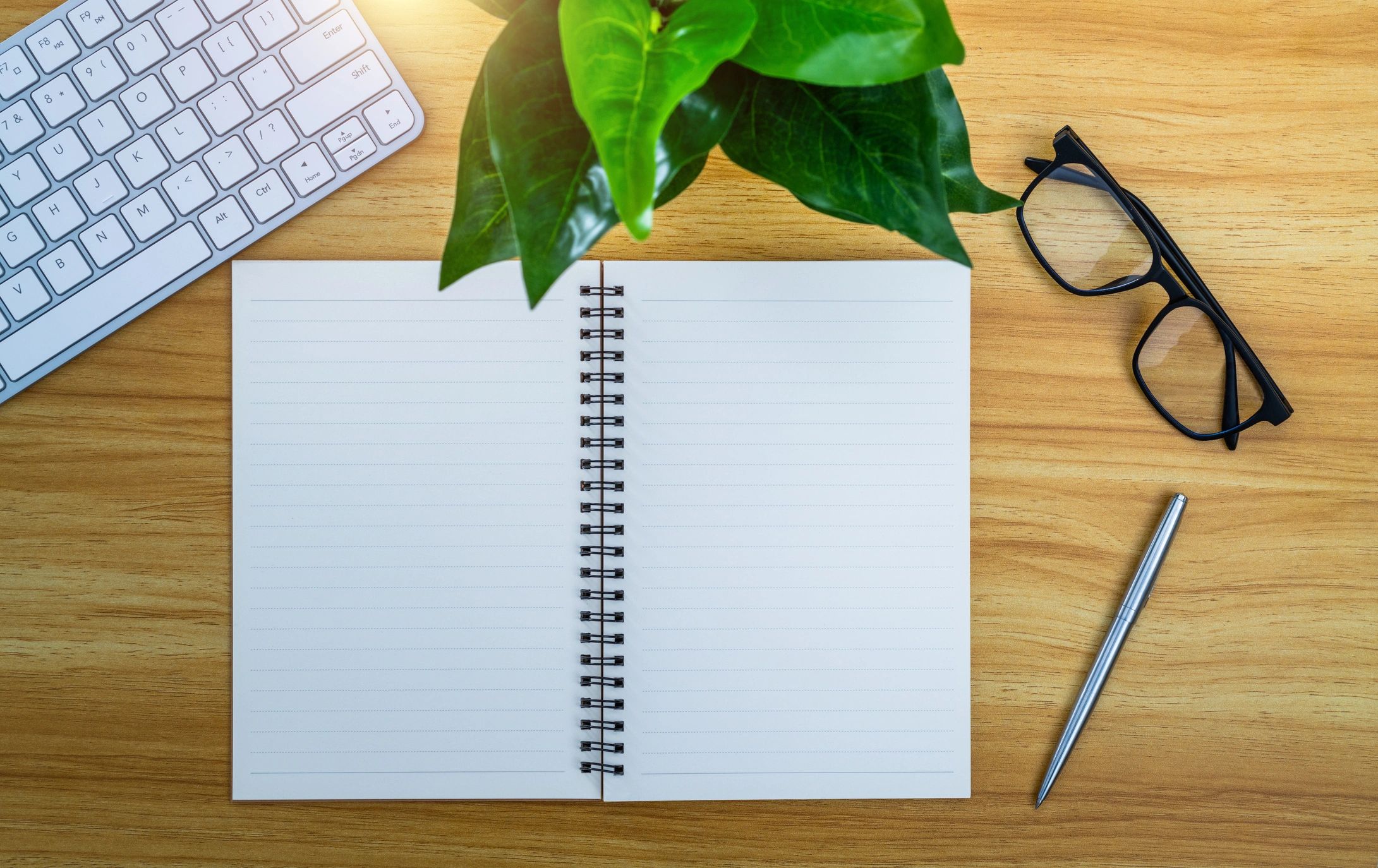 Notebook and office supplies on a desk
